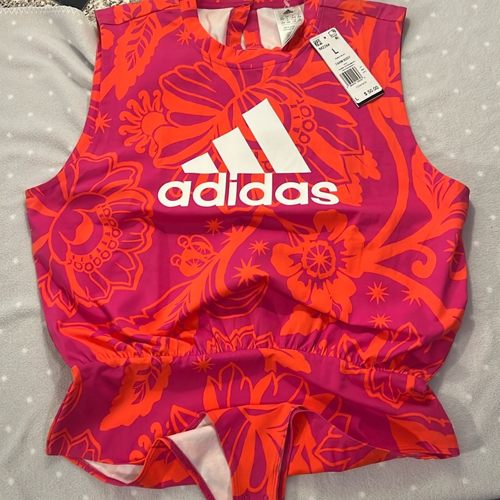 This colorful Adidas onesie Very stretching Large